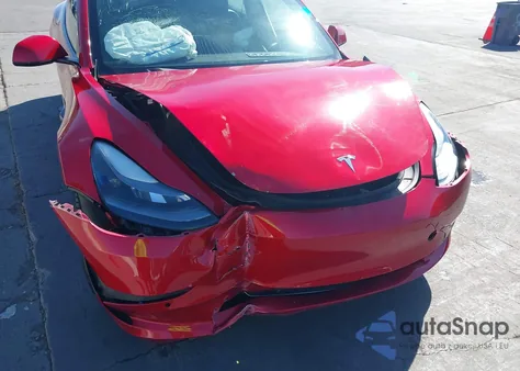 2021 Tesla Model 3 Standard Range Plus Rear-Wheel Drive z USA, uszkodzony, nr VIN 5YJ3E1EA9MF874604